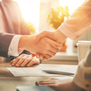 Image of two people shaking hands